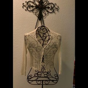 Beautiful delicate button up cardigan.